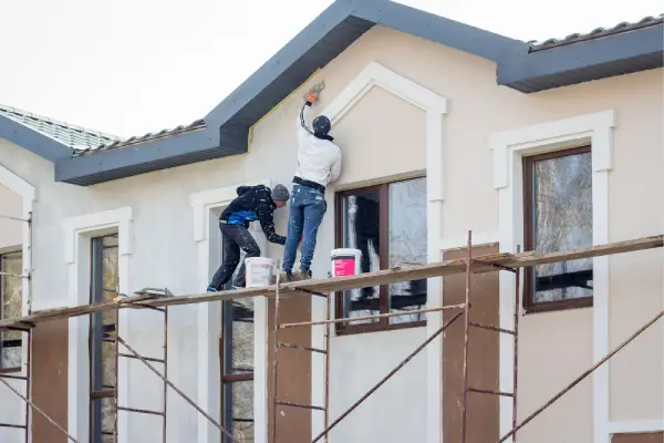 Greenleaf Building Group provides roofing upgrades while standing safely on ladders.
